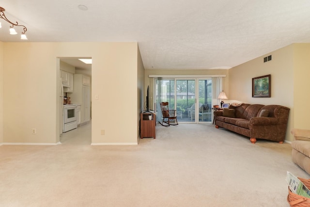41 Brandywine Ct Unit 41, Bloomington, IL 61704 - living area featuring light colored carpet and baseboards