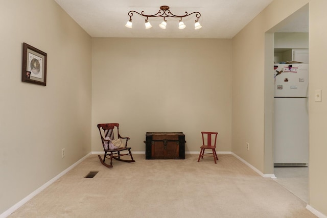 41 Brandywine Ct Unit 41, Bloomington, IL 61704 - sitting room featuring carpet flooring and baseboards