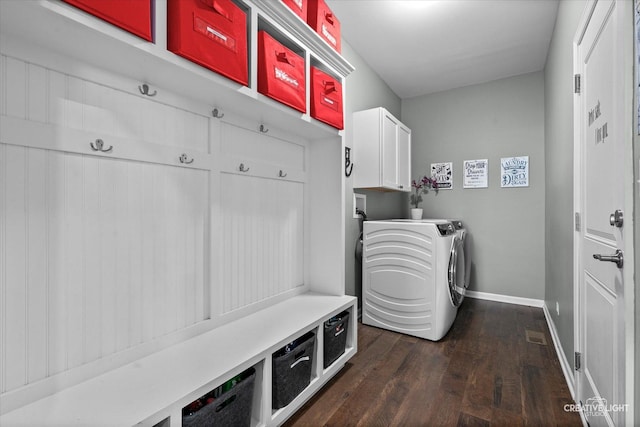 1285 Highpoint Ct, Bartlett, IL 60103 - laundry room with dark wood finished floors, washer and dryer, and cabinet space