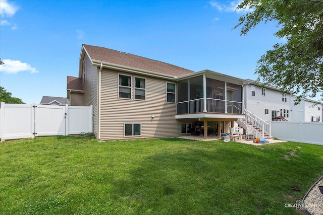 1285 Highpoint Ct, Bartlett, IL 60103 - rear view of house with a sunroom, a fenced backyard, a gate, and stairs