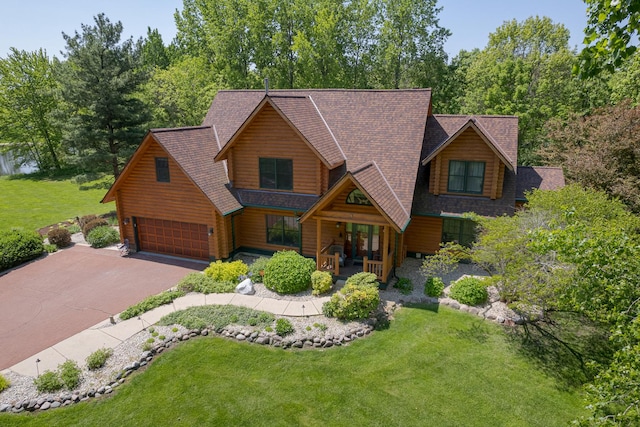 10415 Ridge Ln, Huntley, IL 60142 - view of front of house featuring covered porch, driveway, and a front lawn