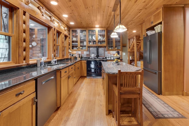 10415 Ridge Ln, Huntley, IL 60142 - kitchen featuring appliances with stainless steel finishes, wood ceiling, recessed lighting, a sink, and light wood-type flooring