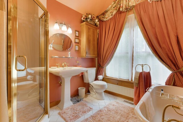 10415 Ridge Ln, Huntley, IL 60142 - bathroom featuring toilet, tile patterned floors, and a stall shower