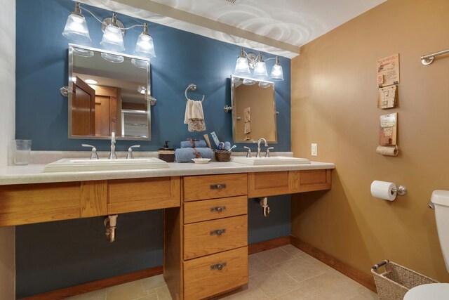 10415 Ridge Ln, Huntley, IL 60142 - full bath with toilet, double vanity, baseboards, and tile patterned flooring