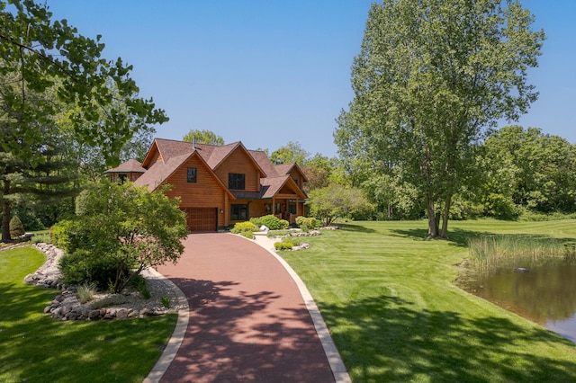 10415 Ridge Ln, Huntley, IL 60142 - log home with a front lawn, driveway, a garage, and a water view