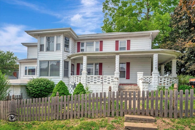 116 N Kankakee St, Wilmington, IL 60481 - view of front facade with a porch and a fenced front yard
