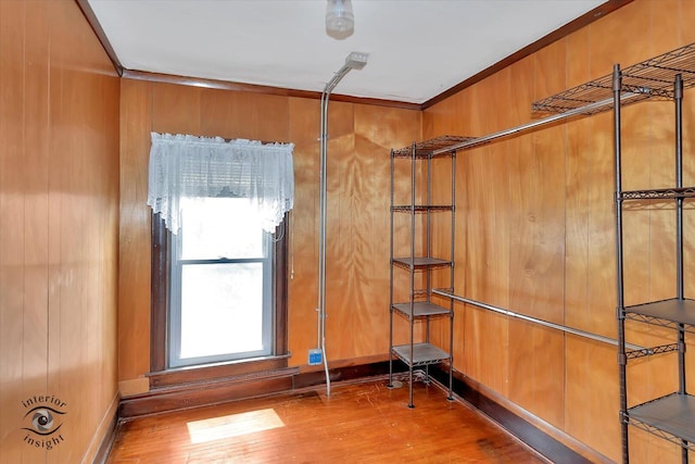 116 N Kankakee St, Wilmington, IL 60481 - interior space with wood finished floors, crown molding, and wooden walls