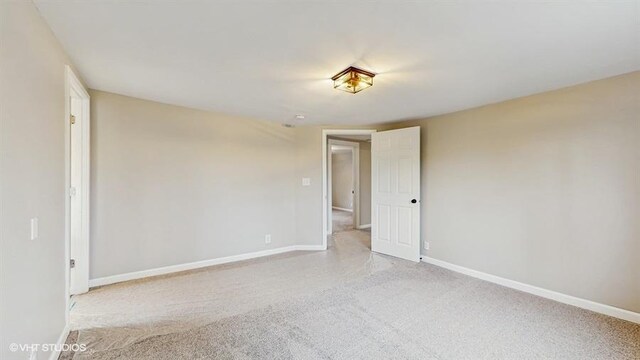4622 Schwartz Ave, Lisle, IL 60532 - unfurnished room featuring baseboards and light carpet