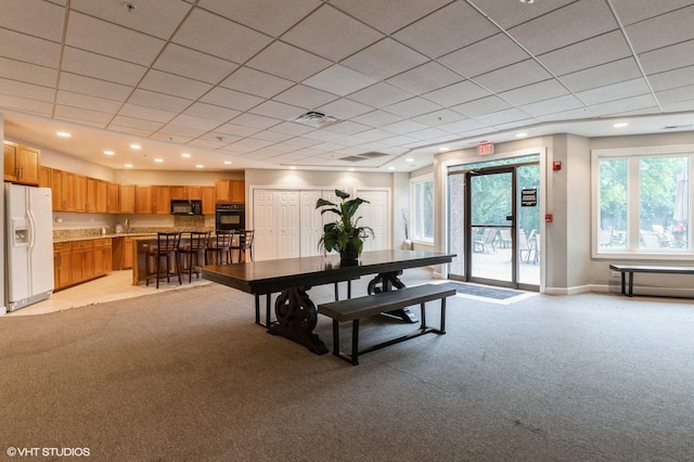 1 Renaissance Pl Unit 1018, Palatine, IL 60067 - dining area featuring light colored carpet and baseboards