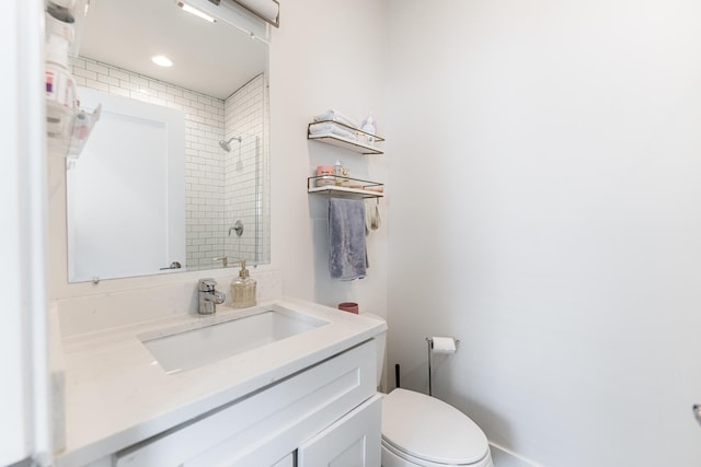 1407 N Bosworth Ave, Chicago, IL 60642 - bathroom with tiled shower, vanity, and toilet