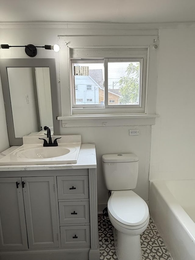 302 E Carroll St, Lanark, IL 61046 - full bathroom with vanity, toilet, a bath, and crown molding