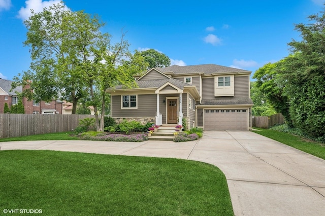 234 E Saint Charles Rd, Elmhurst, IL 60126 - view of front of house with driveway, a garage, and stone siding