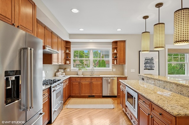234 E Saint Charles Rd, Elmhurst, IL 60126 - kitchen featuring high quality appliances, open shelves, brown cabinets, plenty of natural light, and recessed lighting