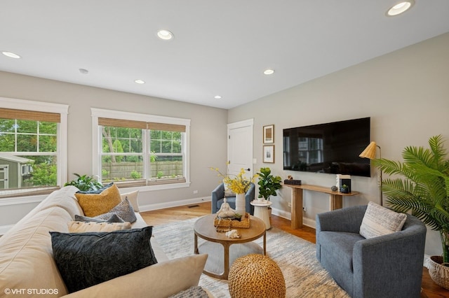 234 E Saint Charles Rd, Elmhurst, IL 60126 - living room with plenty of natural light, recessed lighting, and wood finished floors