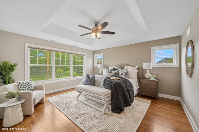 234 E Saint Charles Rd, Elmhurst, IL 60126 - bedroom with wood finished floors, a raised ceiling, and ceiling fan