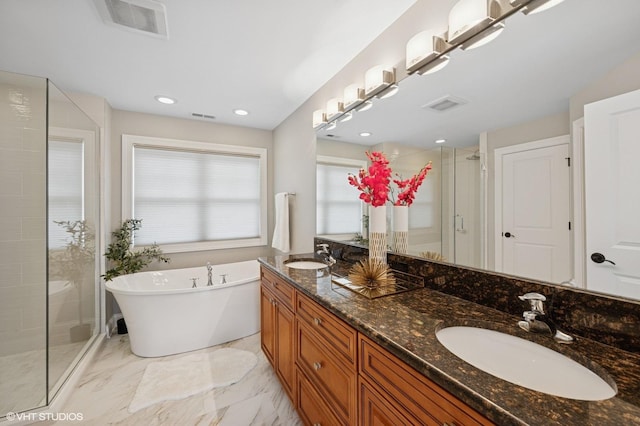 234 E Saint Charles Rd, Elmhurst, IL 60126 - full bathroom with a shower stall, double vanity, a freestanding tub, and marble finish floors