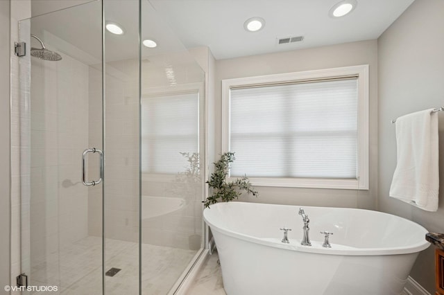 234 E Saint Charles Rd, Elmhurst, IL 60126 - bathroom featuring a stall shower, a freestanding bath, marble finish floors, and recessed lighting