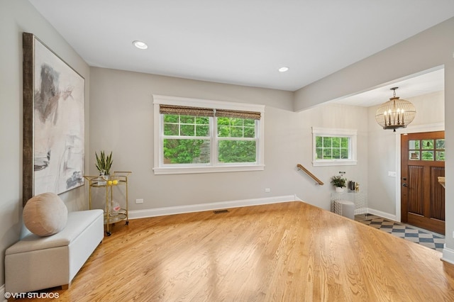 234 E Saint Charles Rd, Elmhurst, IL 60126 - foyer entrance featuring a chandelier, wood finished floors, and recessed lighting