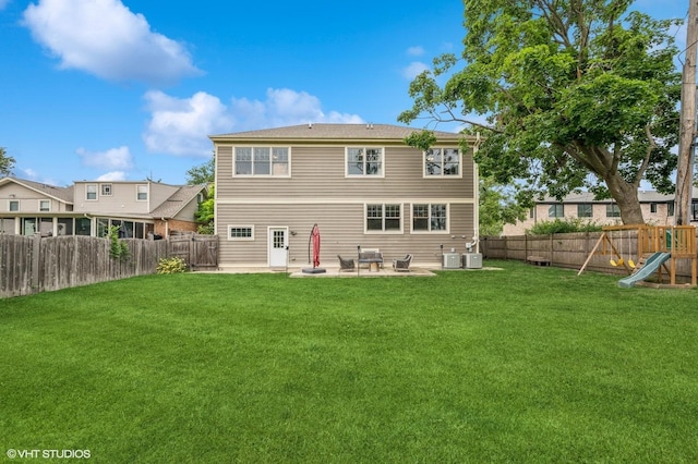 234 E Saint Charles Rd, Elmhurst, IL 60126 - rear view of house featuring a patio, a fenced backyard, and a playground