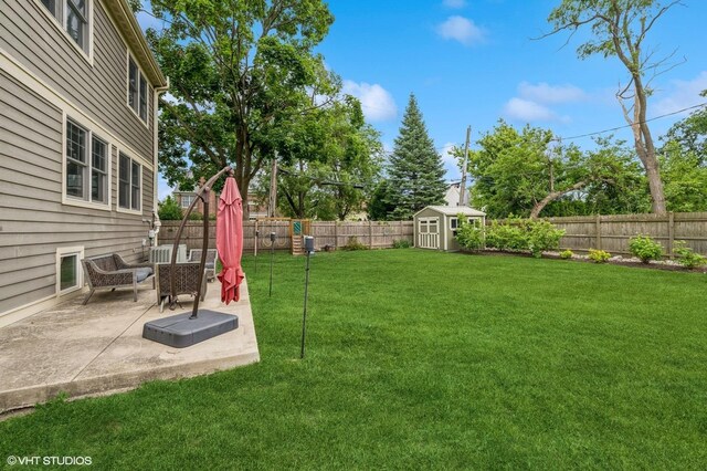 234 E Saint Charles Rd, Elmhurst, IL 60126 - fenced backyard featuring a shed and a patio area