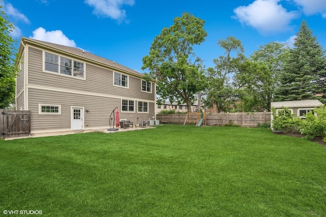 234 E Saint Charles Rd, Elmhurst, IL 60126 - back of property featuring a patio area and a fenced backyard