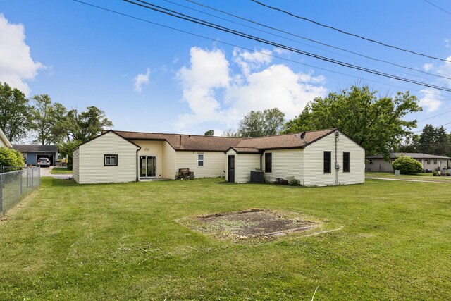 510 S Sycamore St, Genoa, IL 60135 - rear view of property with central AC unit