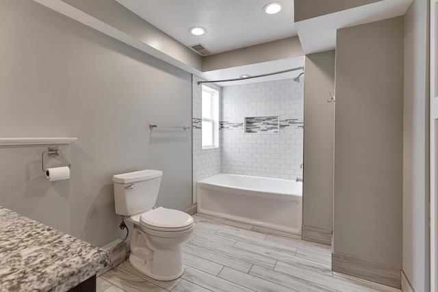 510 S Sycamore St, Genoa, IL 60135 - full bath featuring toilet, baseboards, shower / washtub combination, and recessed lighting