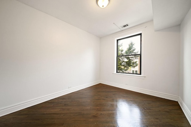 4054 W Palmer St Unit 2, Chicago, IL 60639 - empty room featuring baseboards and dark wood finished floors