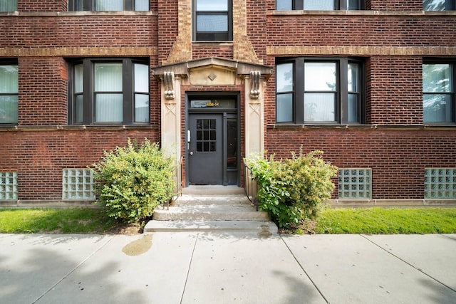4054 W Palmer St Unit 2, Chicago, IL 60639 - property entrance featuring brick siding