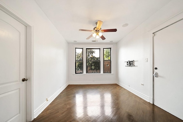 4054 W Palmer St Unit 2, Chicago, IL 60639 - spare room with dark wood-style floors, a ceiling fan, and baseboards