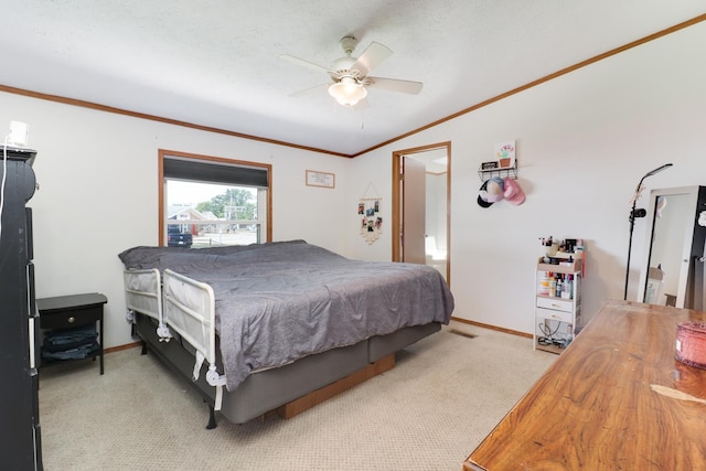 103 S Benson St, Lexington, IL 61753 - bedroom with crown molding, carpet, and ceiling fan