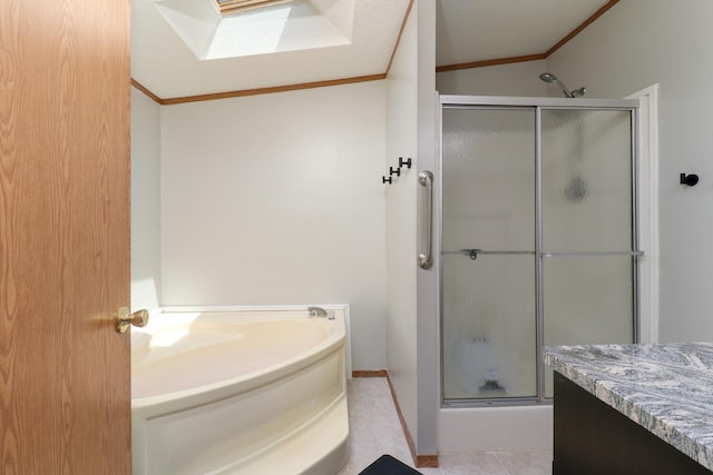 103 S Benson St, Lexington, IL 61753 - full bath featuring ornamental molding, a stall shower, a skylight, a garden tub, and tile patterned flooring