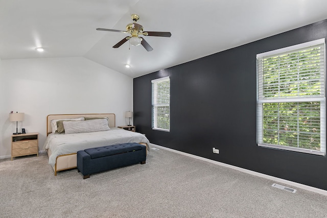 131 Bristol Ln Unit 2, Wood Dale, IL 60191 - carpeted bedroom featuring multiple windows, lofted ceiling, ceiling fan, and baseboards