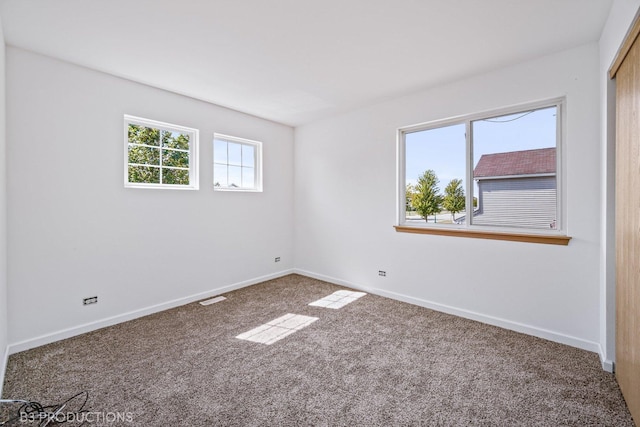 6520 Bridle Path Dr, Matteson, IL 60443 - spare room with carpet and baseboards