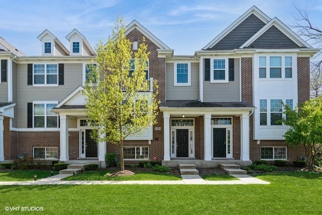1425 N Charles Ave, Naperville, IL 60563 - view of front of property with brick siding and a front lawn