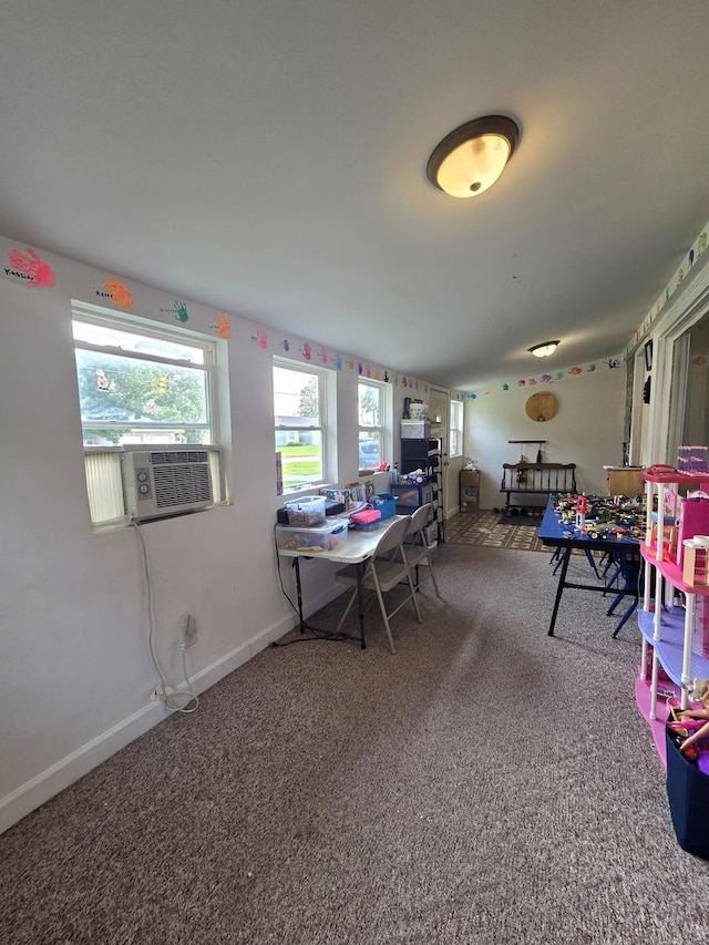 108 E Washington St, Ashkum, IL 60911 - playroom with cooling unit, carpet floors, and baseboards