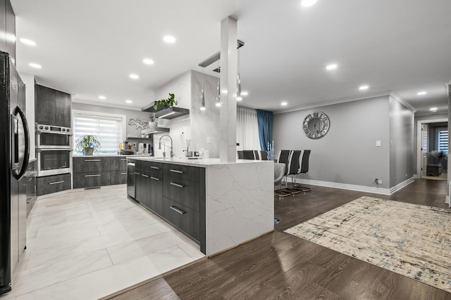 7215 Birchwood Ct Unit 19B, Willowbrook, IL 60527 - kitchen with modern cabinets, crown molding, open shelves, black fridge, and double oven