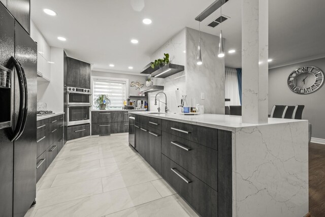 7215 Birchwood Ct Unit 19B, Willowbrook, IL 60527 - kitchen with modern cabinets, appliances with stainless steel finishes, recessed lighting, open shelves, and a center island with sink