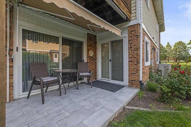 7215 Birchwood Ct Unit 19B, Willowbrook, IL 60527 - view of patio featuring cooling unit