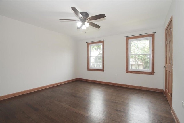 1711 White St, Des Plaines, IL 60018 - unfurnished room with dark wood-type flooring, a ceiling fan, and baseboards