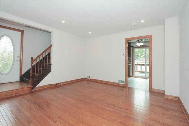 1711 White St, Des Plaines, IL 60018 - unfurnished room with hardwood / wood-style floors, stairway, recessed lighting, baseboards, and a ceiling fan