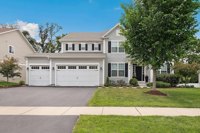 819 Heatherfield Cir, Naperville, IL 60565 - view of front facade with driveway, a front yard, and an attached garage