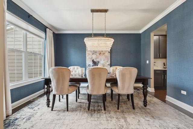 819 Heatherfield Cir, Naperville, IL 60565 - dining room with a chandelier, wood finished floors, baseboards, and ornamental molding