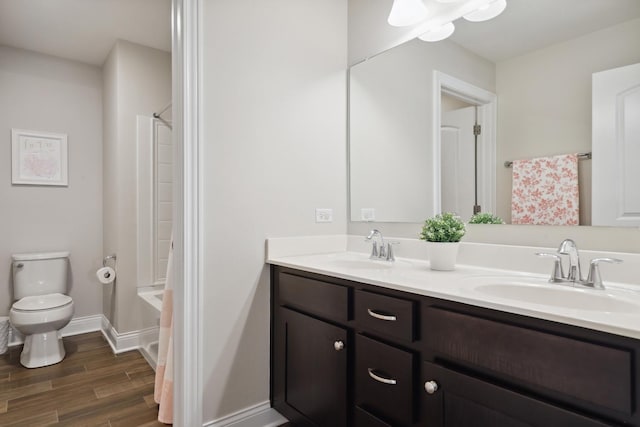 819 Heatherfield Cir, Naperville, IL 60565 - full bath with double vanity, toilet, wood finished floors, tub / shower combination, and baseboards