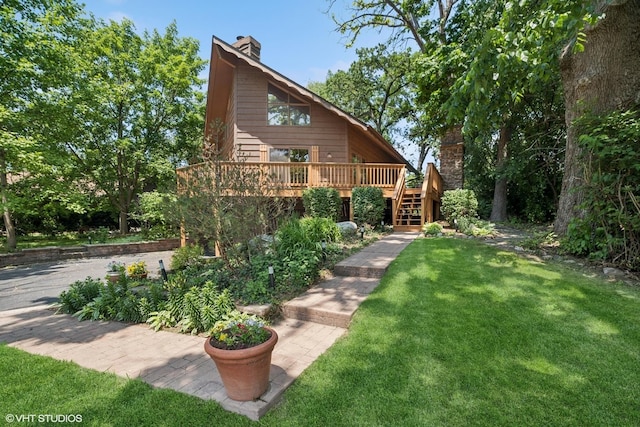 11214 Halma Ln, Woodstock, IL 60098 - view of green lawn featuring a deck and stairs