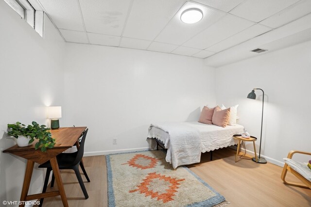 11214 Halma Ln, Woodstock, IL 60098 - bedroom featuring a drop ceiling and wood finished floors