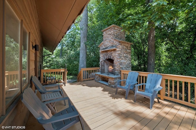 11214 Halma Ln, Woodstock, IL 60098 - wooden deck featuring an outdoor stone fireplace