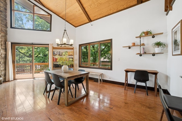 11214 Halma Ln, Woodstock, IL 60098 - dining room with a chandelier, a wood ceiling with exposed beams, hardwood / wood-style floors, and high vaulted ceiling