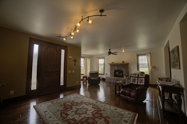 1897 N 2500 E Rd, Watseka, IL 60970 - foyer entrance with a fireplace, plenty of natural light, hardwood / wood-style flooring, and ceiling fan