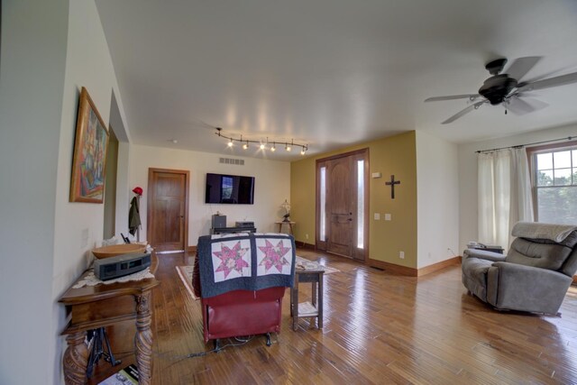 1897 N 2500 E Rd, Watseka, IL 60970 - living area with wood finished floors and ceiling fan